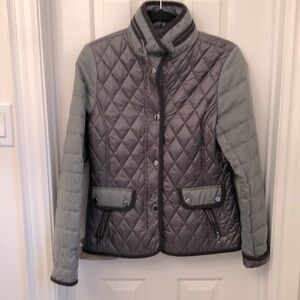 Light quilted grey jacket,worn 2-3 times,hidden hood.Excellent condition